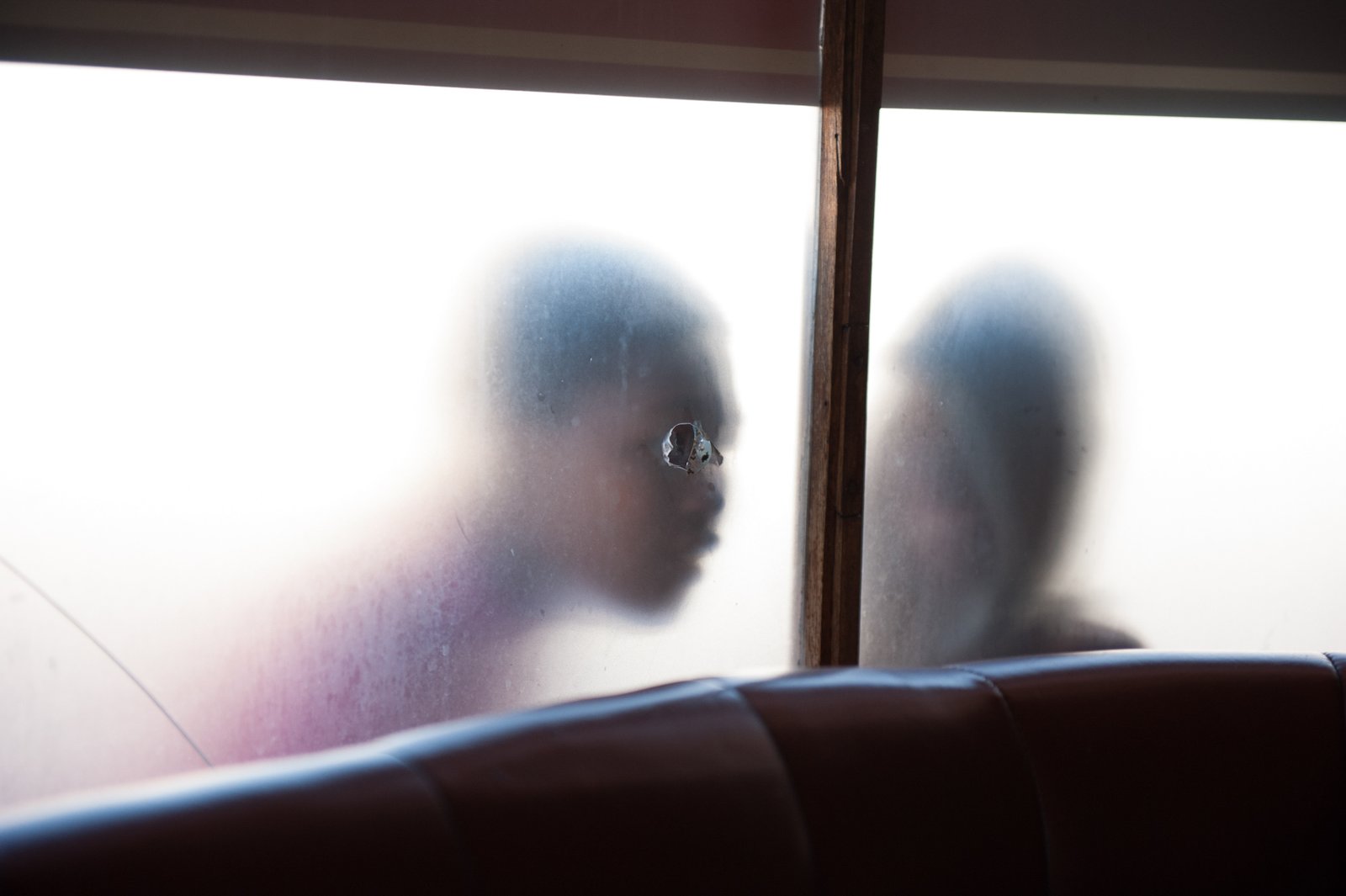 Diner window in beyond the frame photography by Jac Kritzinger